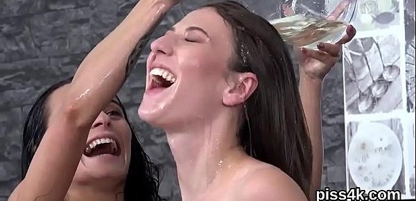 trendsSensual lesbian sweeties get splashed with piss and squirt wet vaginas